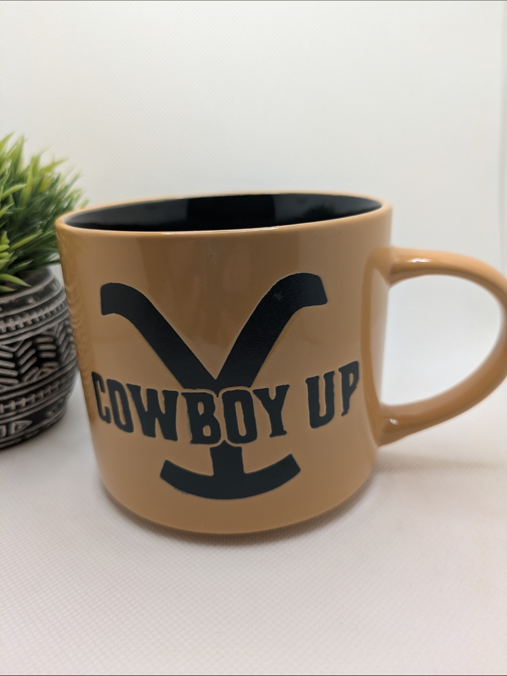 Yellowstone Cowboy Up Ceramic Mug in Tan with Black Interior